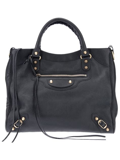 Buy our latest collection of balenciaga bags at fwrd free shipping for orders above $100 usd. Balenciaga Tote Bag in Black | Lyst