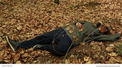 Dead Or Drunk Woman Lying On The Ground Among The Withered Leaves Stock Video Footage 8747840