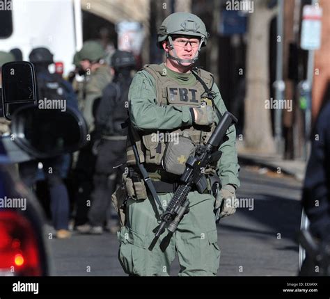 Various Swat Teams Stage Along High Street During The Yale Lockdown