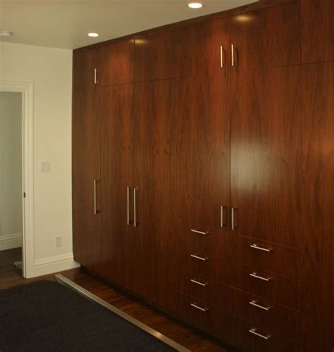 The cupboards are cubbies or shelves divided into square compartments. 25+ Solid Wood Wardrobe Closets | Wardrobe Ideas