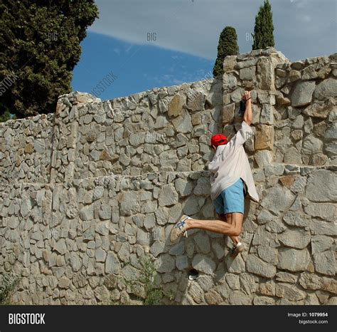 Man Climbing Wall Image And Photo Free Trial Bigstock