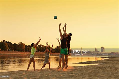 Young People Playing Beach Ball High Res Stock Photo Getty Images