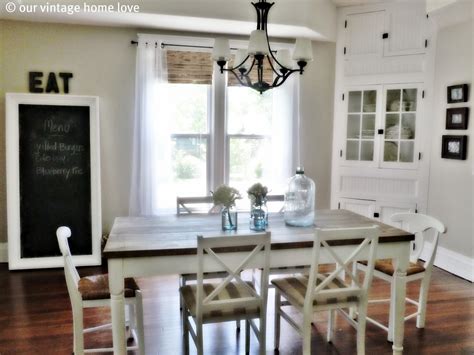 I absolutely love to mix styles and decor in unexpected ways and this modern meets vintage dining room is the perfect combination. vintage home love: Dining Room Table