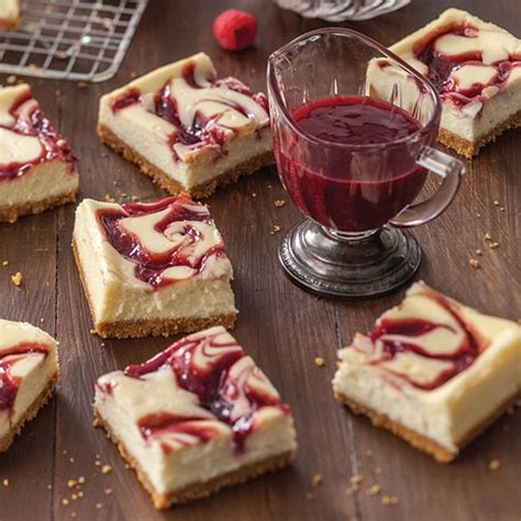 Add eggs, one at a time, beating well after each addition. Raspberry Swirl Cheesecake Bars - Paula Deen Magazine ...