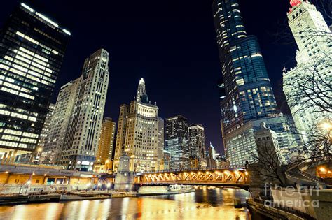Navy pier, which extends into lake michigan farther north, on the city's eastern side, is also a great place to go if you are looking to enjoy a stunning chicago skyline view. Chicago River Skyline at Night Photograph by Paul Velgos