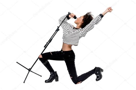 Young Singer With Microphone — Stock Photo © Dmitrypoch 150948850