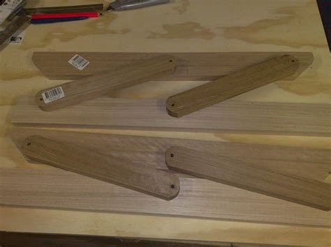 Building a hidden lift top / dual height coffee table, with retro style hairpin legs and storage cubby. DIY Lift Top Coffee Table