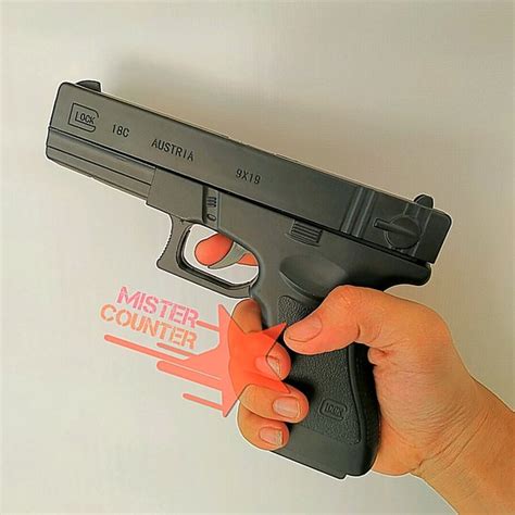 Jual Korek Api Pistol Glock Bonus Pajangan Korek Gas Pistol Korek