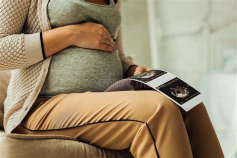Pregnant Belly And The Printed Ultrasound Results Stock Photo Image