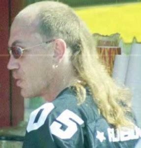 Long stranded top with skin faded sides. Mullet Haircut and Hair Style: How To - Men's Hair Blog
