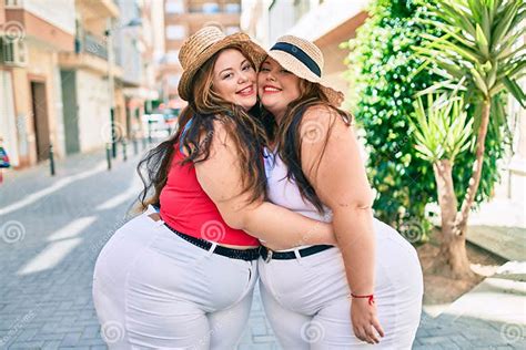 Two Plus Size Overweight Sisters Twins Women Hugging Together Outdoors Stock Image Image Of
