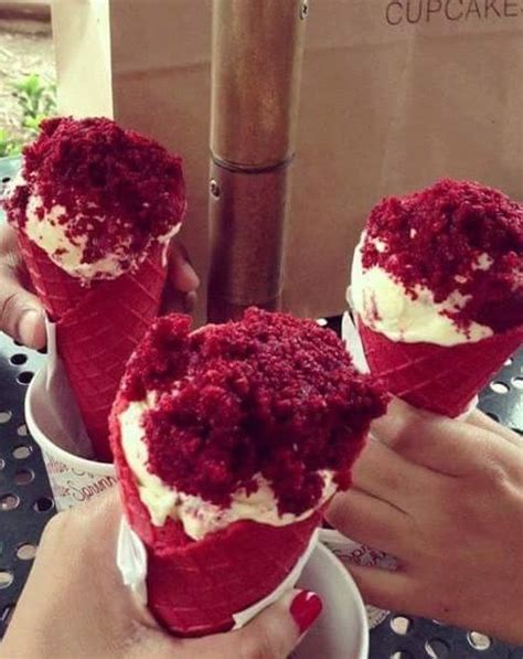 Red Velvet Cake On Top Of Vanilla Ice Cream In A Red