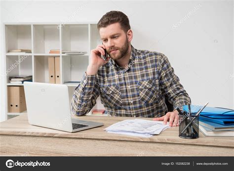 Businessman Working At Modern Office Stock Photo By ©zaramuzafarova