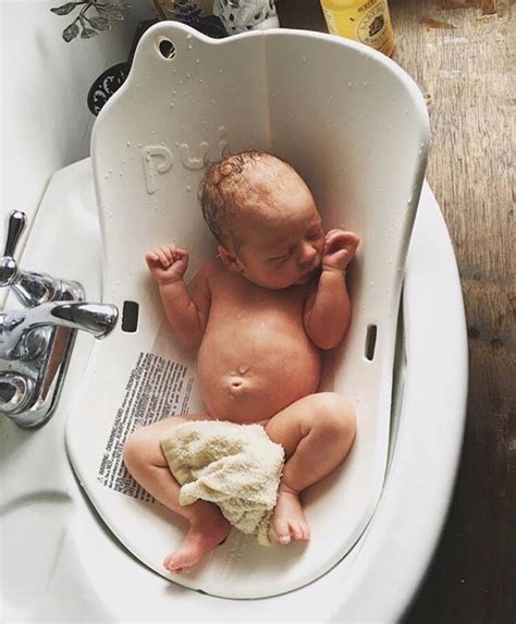 When does your baby outgrow the baby bath? adorable newborn in the puj tub | Pinterest: Natalia ...