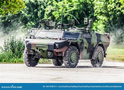 German Light Armoured Reconnaissance Vehicle Drives On A Road Stock