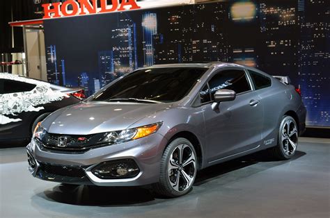The 2014 civic coupe and coupe si following a major refresh of civic sedan styling for 2013, honda turns its attention to the civic coupe and coupe si, implementing a host of exterior design changes that include a more aggressive grille, hood, front fenders and headlight design. © Automotiveblogz: 2014 Honda Civic Si Coupe: SEMA 2013 Photos