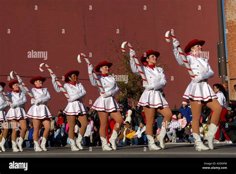 Band Of Majorettes Marching During A Christmas Parade Stock Photo Alamy