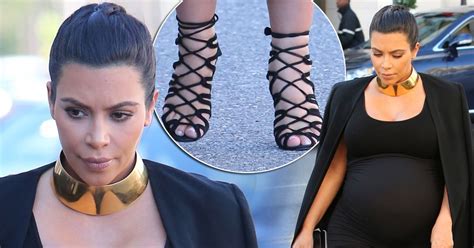 Kim Kardashian Squeezes Into Black Heels As She Admits Her Feet Are