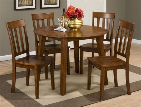 Simplicity Caramel Extendable Round Drop Leaf Dining Room Set From
