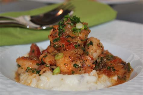 Spicy Shrimp And Andouille Over Charleston Style Grits