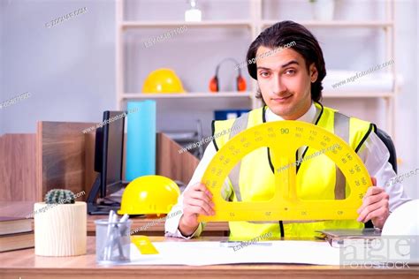 Young Male Architect Working In The Office Stock Photo Picture And