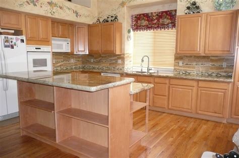 Dear editor(s), i'm hoping you can advise me regarding the best way to improve the look of cabinets covered with photographed (artificial) wood vinyl. 7 Things to Consider Before Refinishing Your Kitchen ...