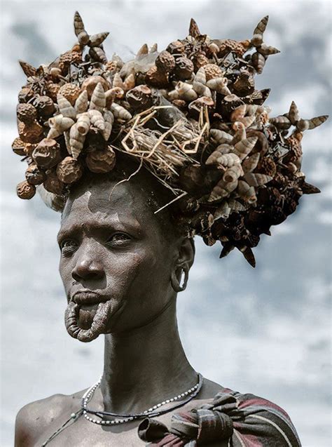 A Mursi Woman With Ceremonial Headdress African Tribes African Women