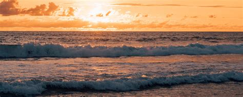 Download Wallpaper 2560x1024 Sunset Sea Waves Beach Ultrawide