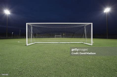 Soccer Goal On Field At Night Stock Photo Getty Images