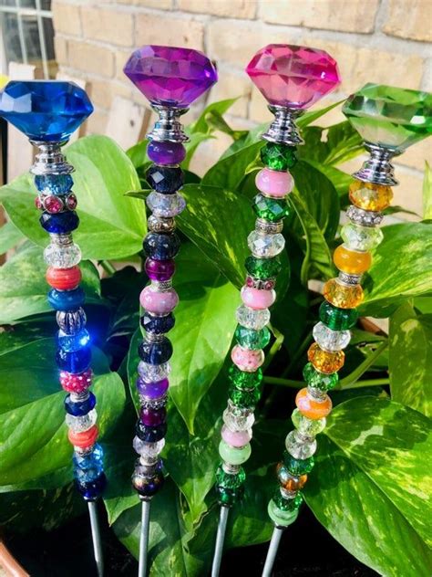 Find unique garden stakes & decorative outdoor decor at uncommon goods. Bright and vibrant glass beaded garden suncatchers, garden ...