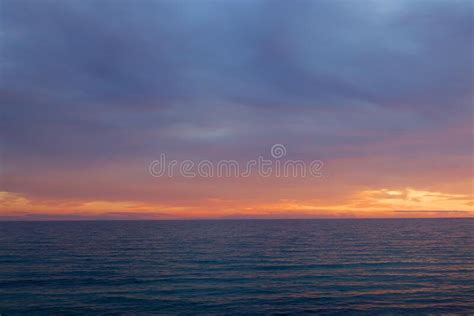 Sunset Sky Clouds Over The Ionian Sea In Apulia Italy Stock Image