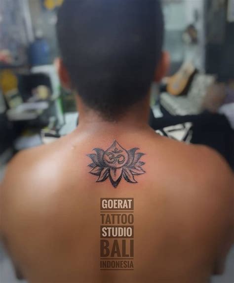 Om Symbol And Lotus Tattoo