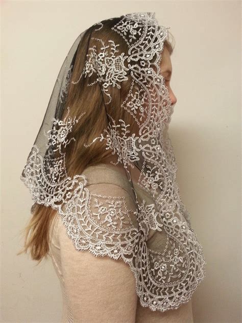 The Spanish Isabella Mantilla In White On Black At
