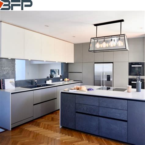 Cabinet refacing involves cosmetic changes like replacing kitchen cabinet doors and hardware or adding a wood veneer or layer of paint. White Laminate Kitchen Cabinets - China Laminate Kitchen ...