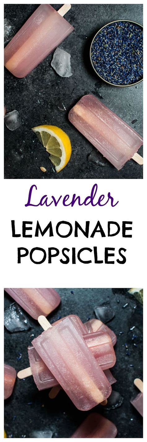 Lavender Lemonade Popsicles On A Black Surface With Blueberries And