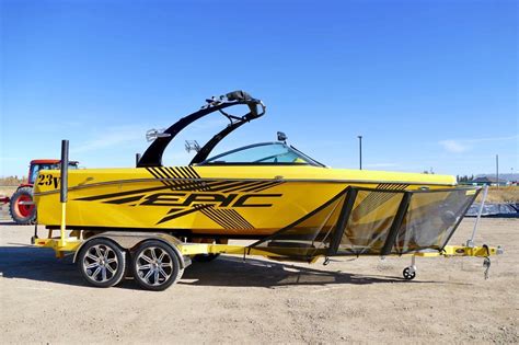 Providing the ultimate stage for. EPIC 23V Wakeboard Boat + Custom Trailer - Yellow/Black ...
