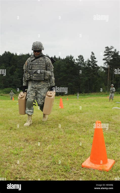 Us Army 2nd Lt Victor Dominguez 172nd Infantry Brigade Runs Through The Filled Water Jug