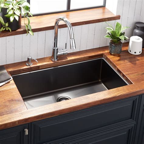 Thin stainless steel sinks can be noisy when water is running. 32" Atlas Stainless Steel Undermount Kitchen Sink ...