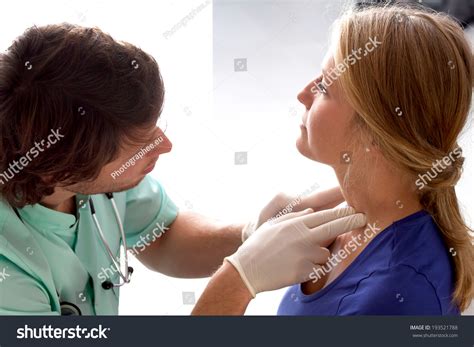 Doctor Checking Lymph Nodes On Patients Stock Photo 193521788