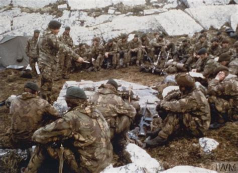 Royal Marines Receive An Open Air Briefing In The Mountains In