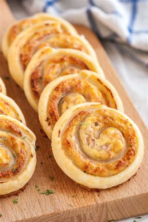 ham and cheese pinwheels are made with cream cheese sliced deli ham and cheese and make a qu