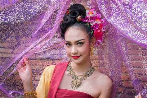 Premium Photo Beautiful Thai Girl In Traditional Dress Costume In Choeng Tha As Thai Temple