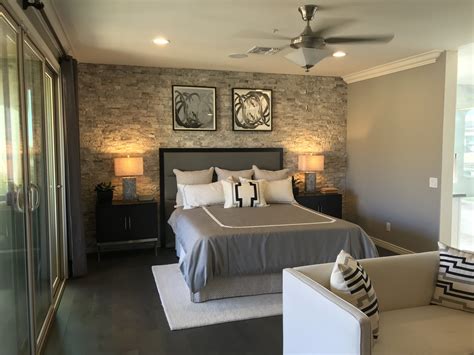 Relaxing Master Bedroom With A Stone Accent Wall To Add A Little Drama