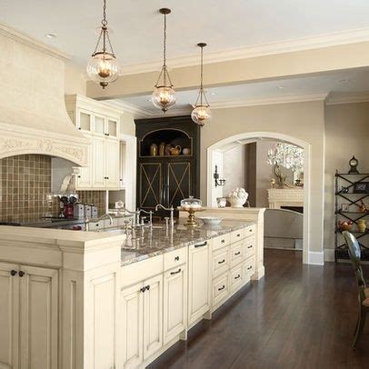Whether you opt for a classic kitchen color scheme or go bold, even a small dose of color can make a big impact. Image result for kitchen wall paint colors with cream ...
