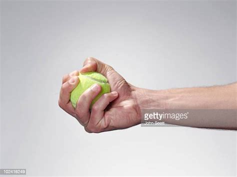 Male Hand Holding Ball Photos And Premium High Res Pictures Getty Images