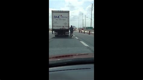 Crazy Hobo Holding Onto Truck While On Bike Youtube