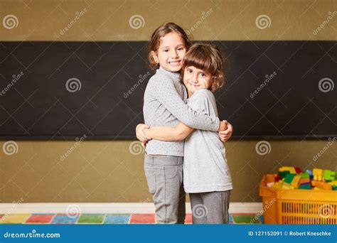 Two Girls Hug Each Other At School Stock Image Image Of School