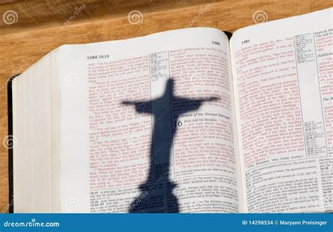 Bible With Red Letters And Shadow Of Jesus Christ Stock Photo Image