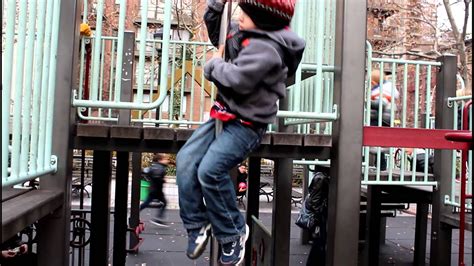 The strength, durability and flexibility of robinia also makes it particularly ideal for use in natural playgrounds. Asher sliding down the fireman's pole at the playground ...