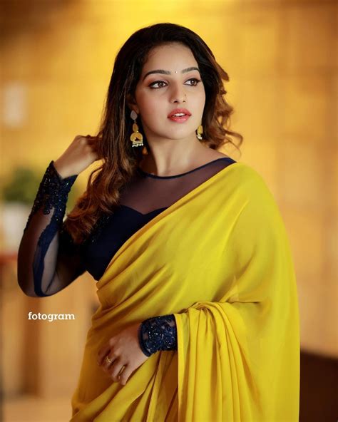 Actress Malavika Menons Stunning Makeover In Yellow Saree For